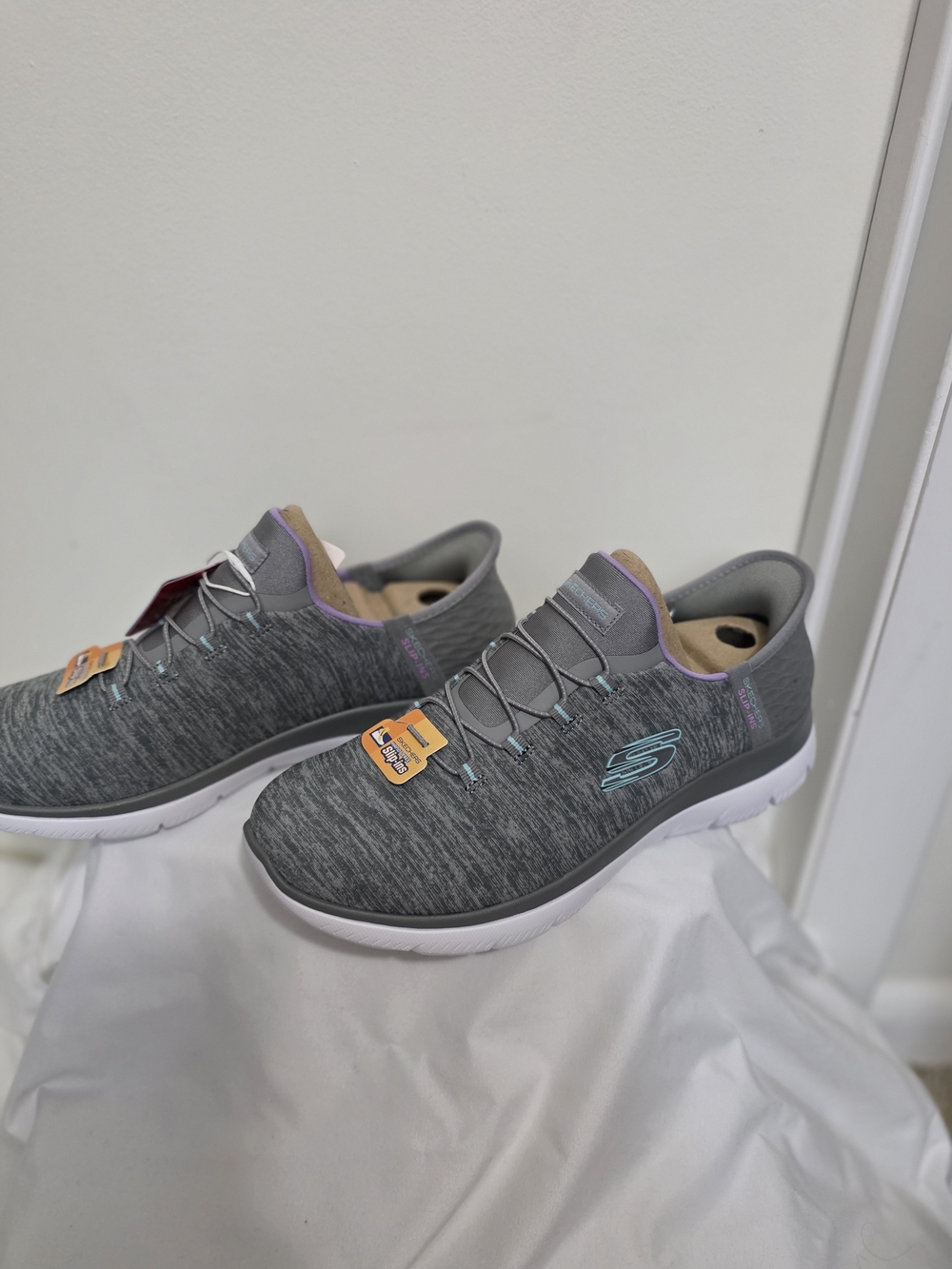 Skechers Womens Size 9.5 Wide Gray Slip-On Athletic Shoes with Light Blue Accent
